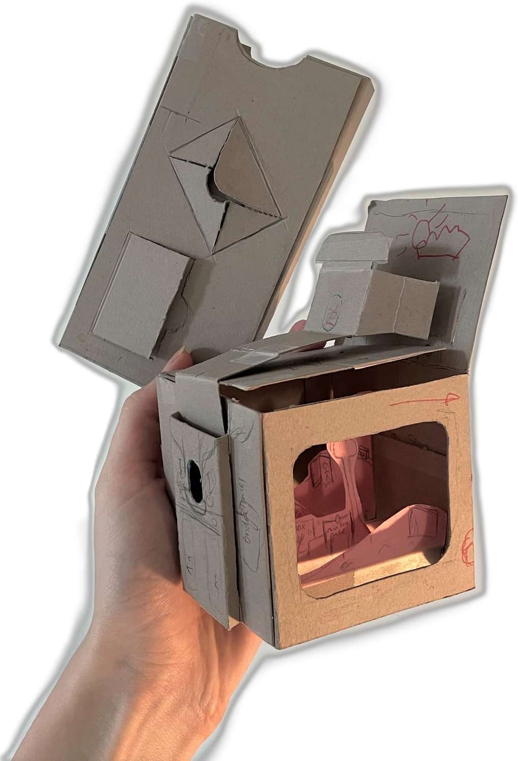 A DIY prototype for TalkMedia, a journalism start-up which hosted an online event I created the physical component for.
      This shot shows the layered tv scene, the pull-out drive-in scene on top, and the overall sleeve
       with reveals connected to the digital space.